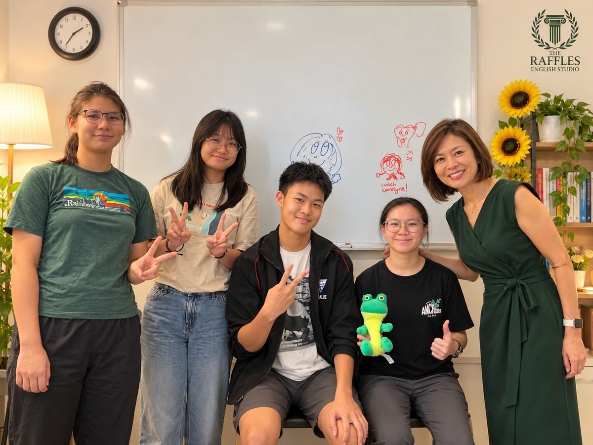 Coach Carolyne with four students at The Raffles English Studio